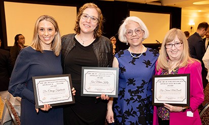 EMU professors Marsack-Topolewski and Kelly with Lisa Kowalski, President of the Board of Directors for The Arc of Oakland County, and State Representative Sharon MacDonell of the Michigan 56