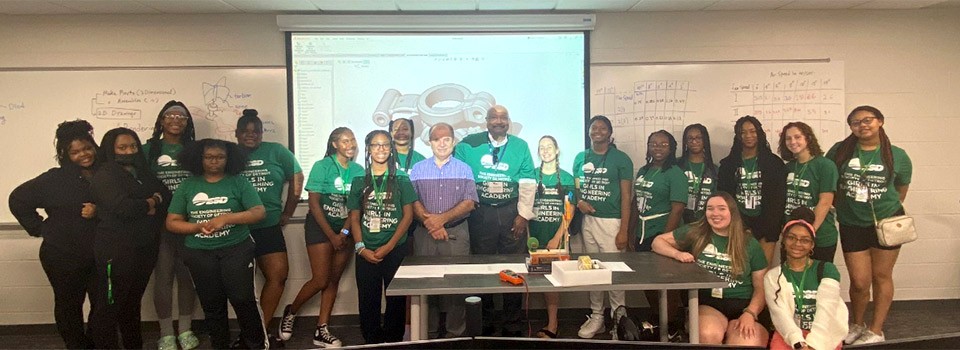 Girls in Engineering Academy Residential Camp learn 3D CAD  with  Dr. Tanbour,  EMU Professor