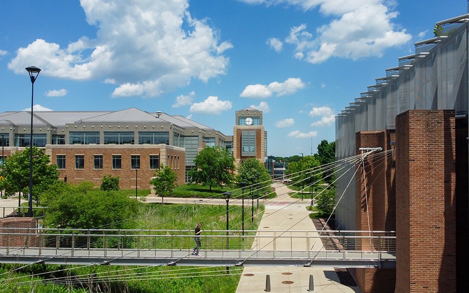 The bridge at Mark Jefferson Science Complex with Halle Library in the background.