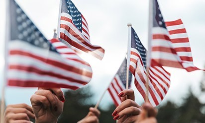 mini American flags being waved