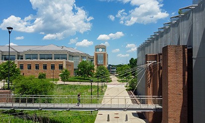 An elevated view of the Science Complex bridge and Hall Library, looking toward the Student Center.
