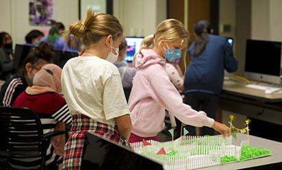 Young girls participate in a summer camp in computer science at EMU.