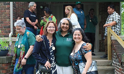Professor Imandeep Grewal with participants in the Community-Engaged Teacher Preparation Summer Institute on the steps of the Boggs Center in Detroit.