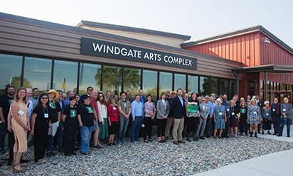 Group photo of those celebrating the unveiling of the Windgate Arts Complex.