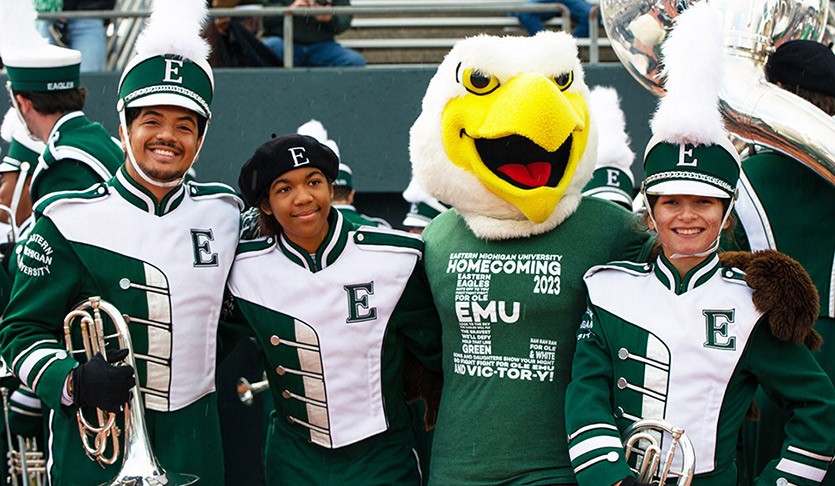 Marching members band and Swoop at Homecoming