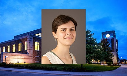 Caroline Buxton headshot on a background photo of Halle Library at dusk.