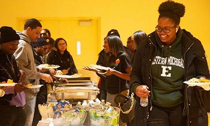 Soul Food and Spoken Word Night attendees enjoy a soul food buffet