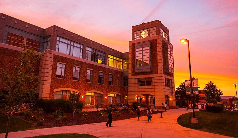 Halle Library exterior at sunset.