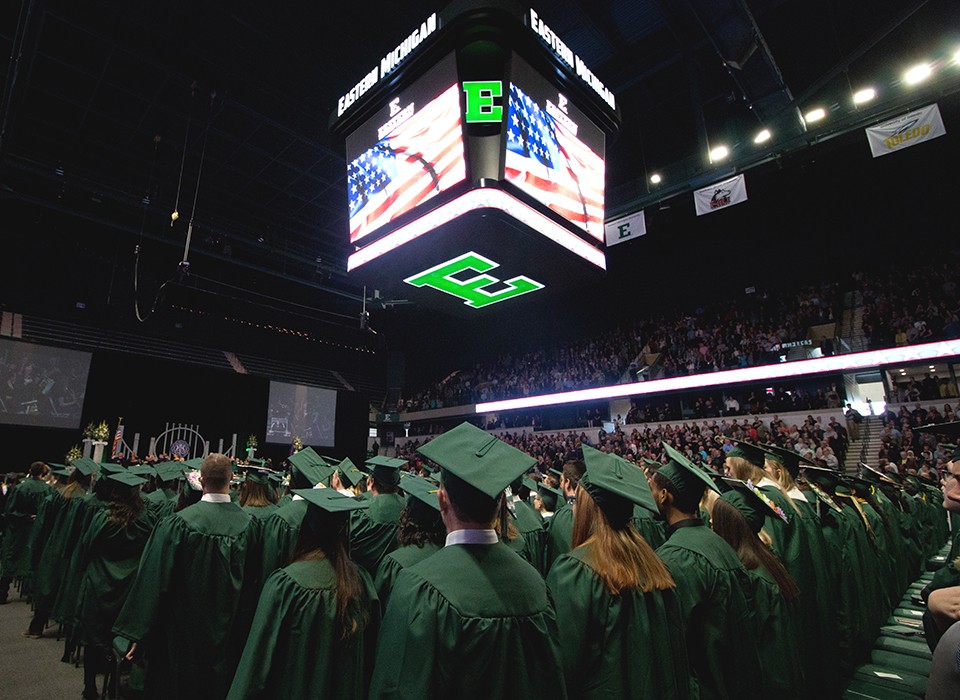 Graduates at commencement ceremony at Convocation Center