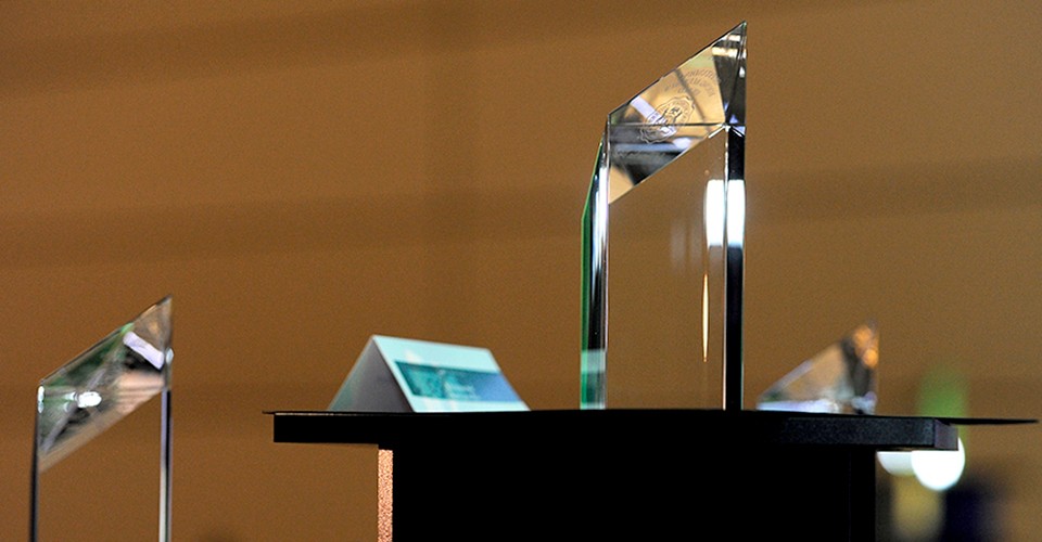The Alumni Award statuettes sit on the table in the Student Center Ballroom.