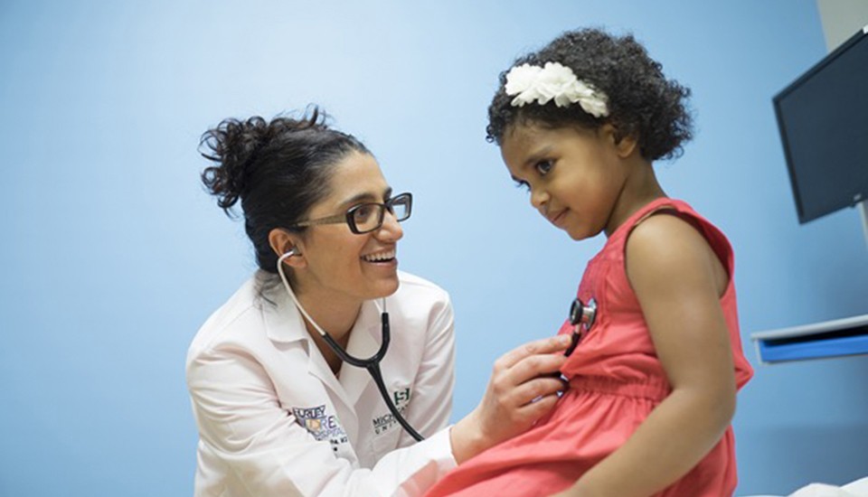 Dr. Hanna-Attisha examines a child