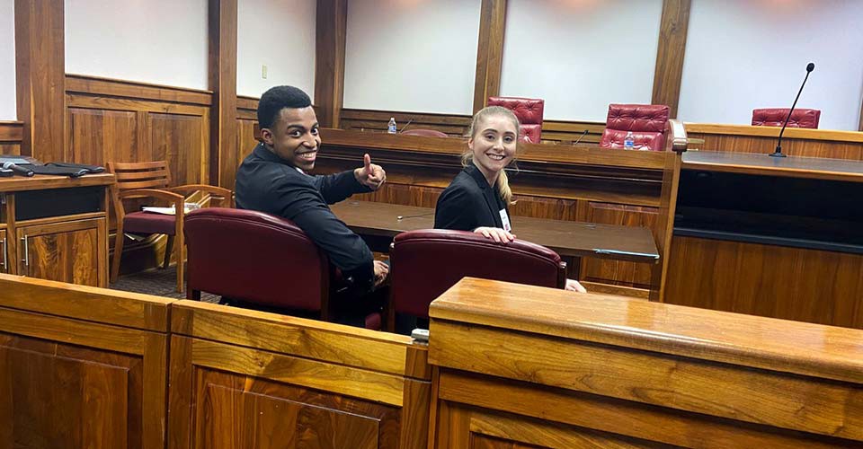 American Moot Court winners are EMU students Charles Graham and Kelsey Hall.