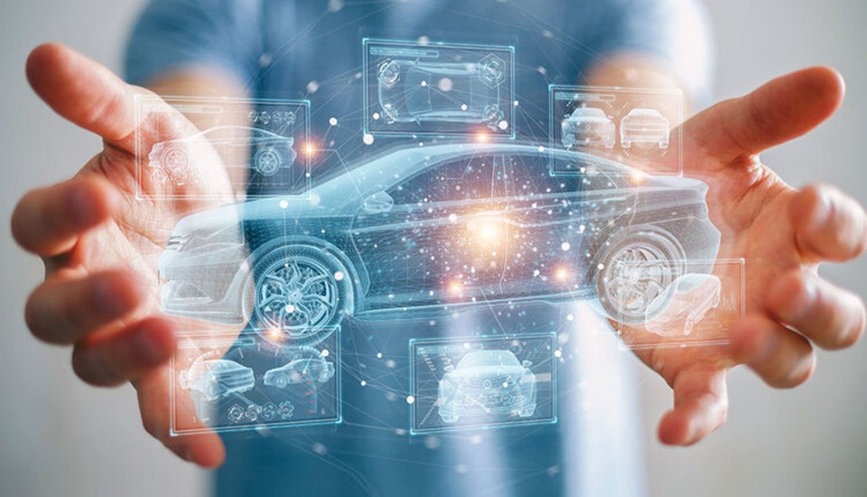Photo illustration of a person's hands around a digital image of an autonomous vehicle
