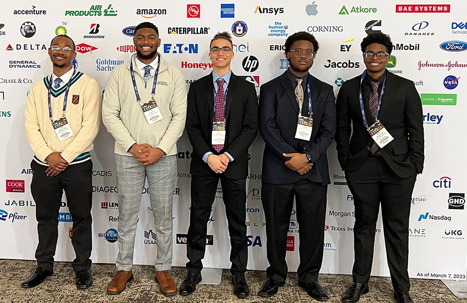 Aaron Hughes, Kevan Pack Jr., Sage Balcita, Josh Hightower, and Mussa Geyre at the National Society of Black Engineers convention in Kansas City, MO