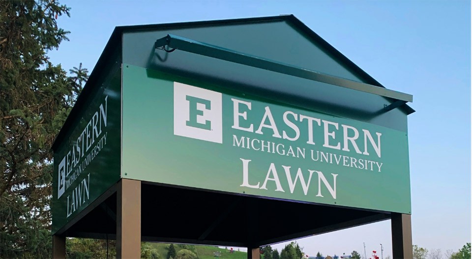 The sign designating the Eastern Michigan University Lawn at Pine Knob