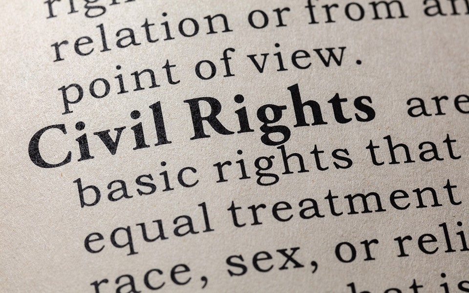A close-up view of the definition of "civil rights" in a dictionary.