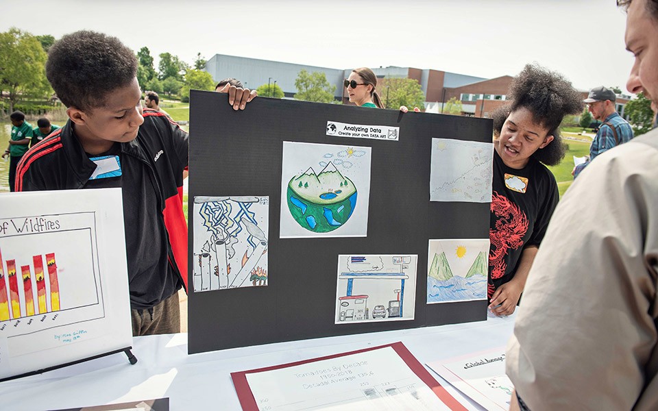 Students participate in an environmental education project.