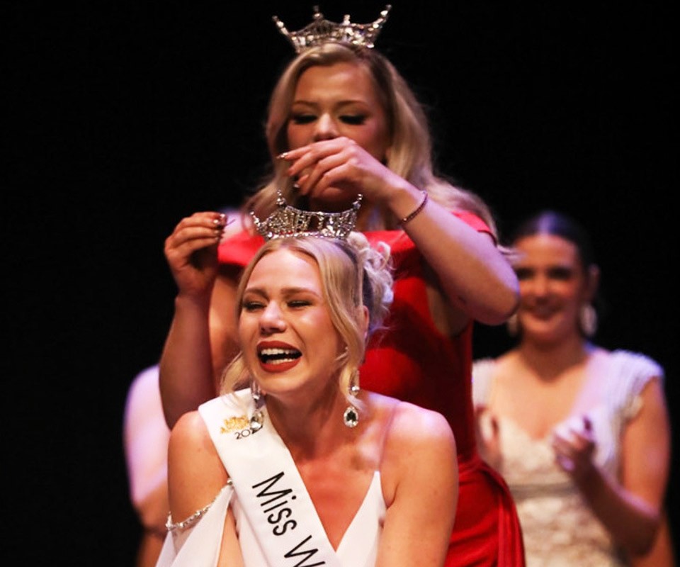 Rylee Clairday cries with joy while being crowned Miss Washtenaw County.