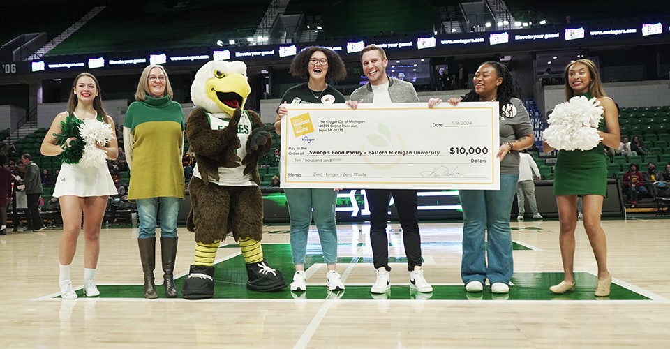 Kroger's check presentation at the recent basketball game