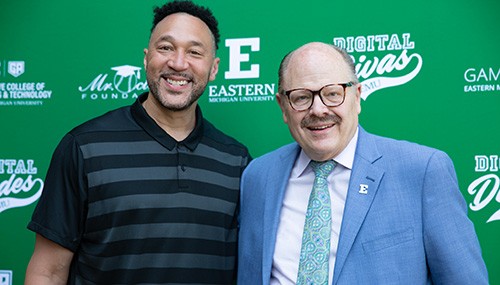 President Smith and EMU alumnus Charlie Batch at the STEM outreach event.