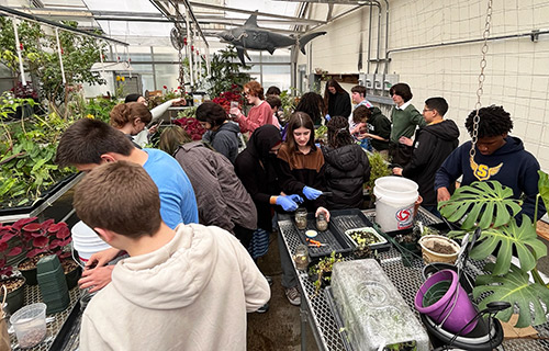 ECA students in the greenhouse