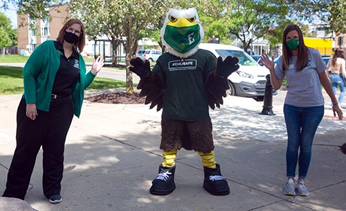 Residence Hall staff and Swoop at move-in